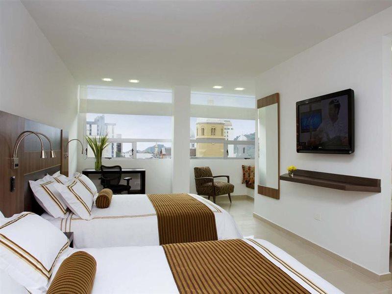 San Simon Hotel Pereira By Soratama المظهر الخارجي الصورة A room at the hotel