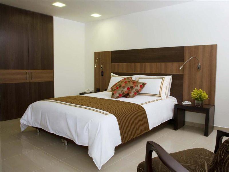 San Simon Hotel Pereira By Soratama المظهر الخارجي الصورة A bedroom