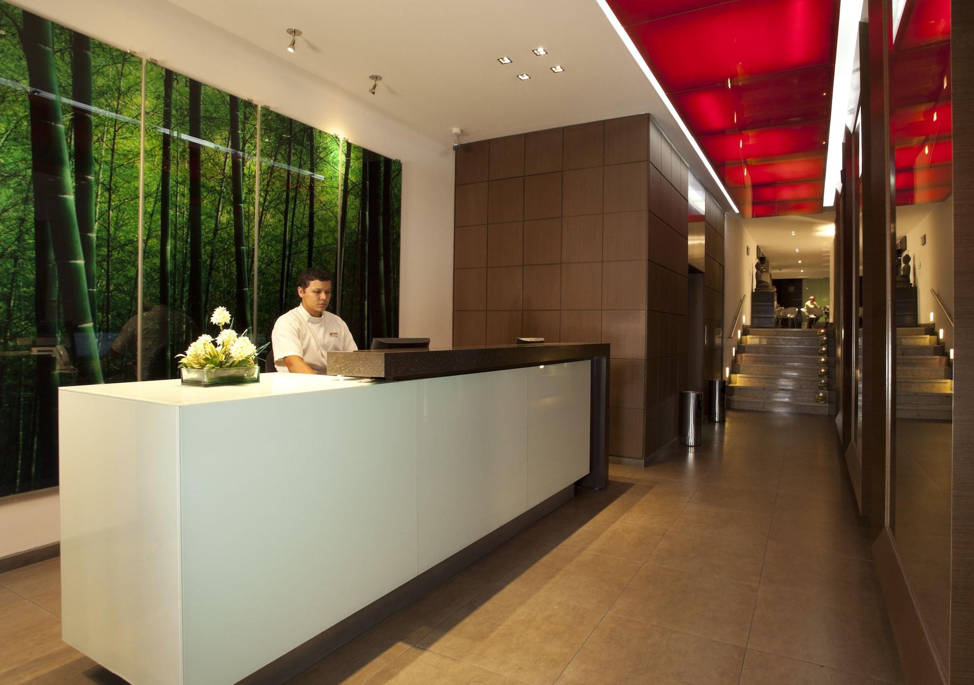 San Simon Hotel Pereira By Soratama المظهر الخارجي الصورة The reception area of the hotel