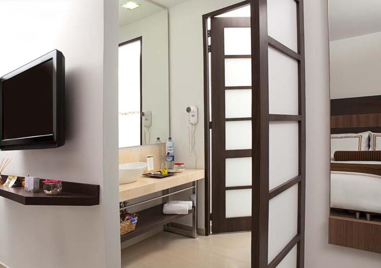 San Simon Hotel Pereira By Soratama المظهر الخارجي الصورة A room at the hotel