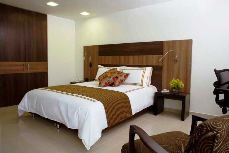San Simon Hotel Pereira By Soratama المظهر الخارجي الصورة A bedroom